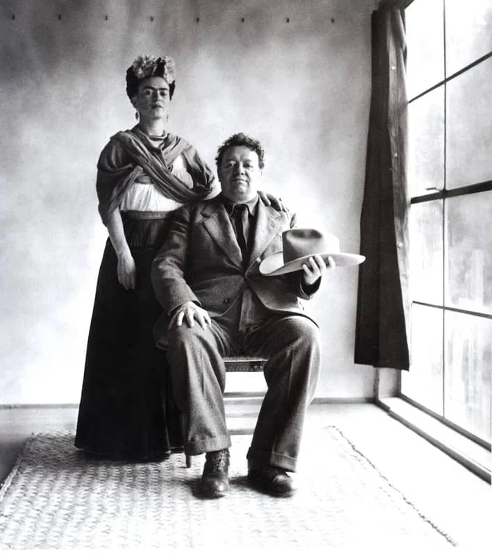 Frida and Diego with hat